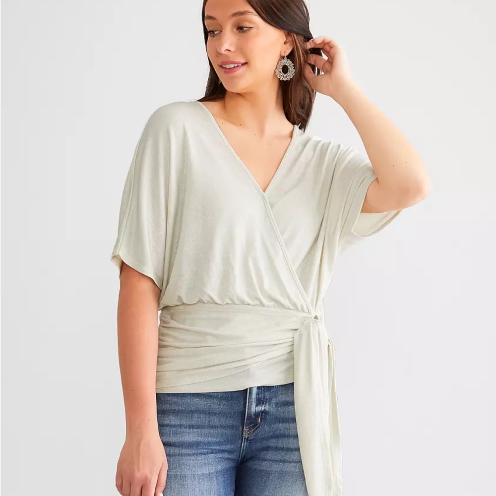 Buckle, Day trip blouse, sheen wrap top, never worn.